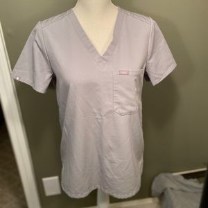 Women’s FIGS gray breast pocket scrub top. Small
